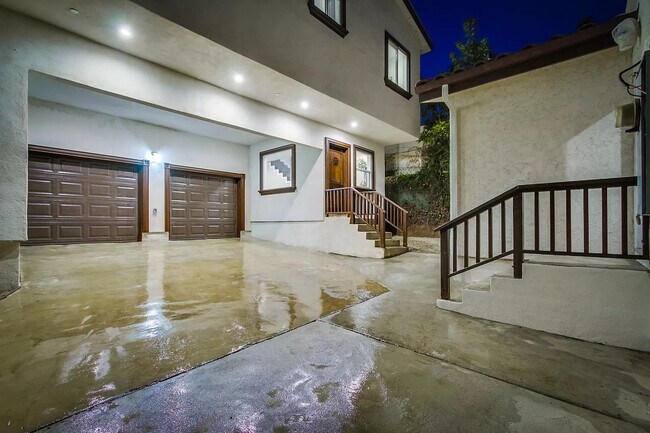 front door - behind the front unit (off-street; more privacy) - 1311 S Hudson Ave
