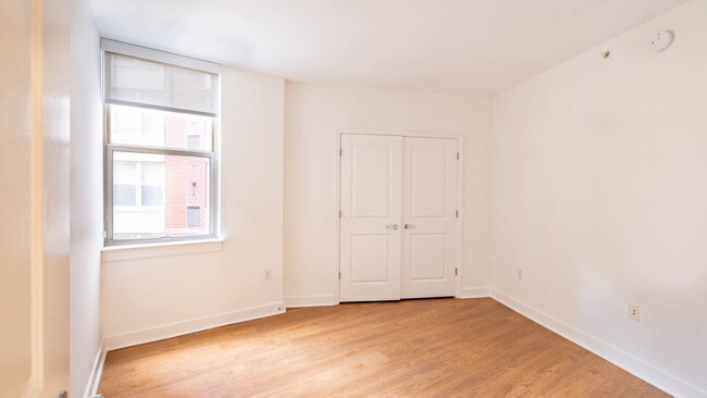 Bedroom with Hard Surface Flooring - 1210 Mass