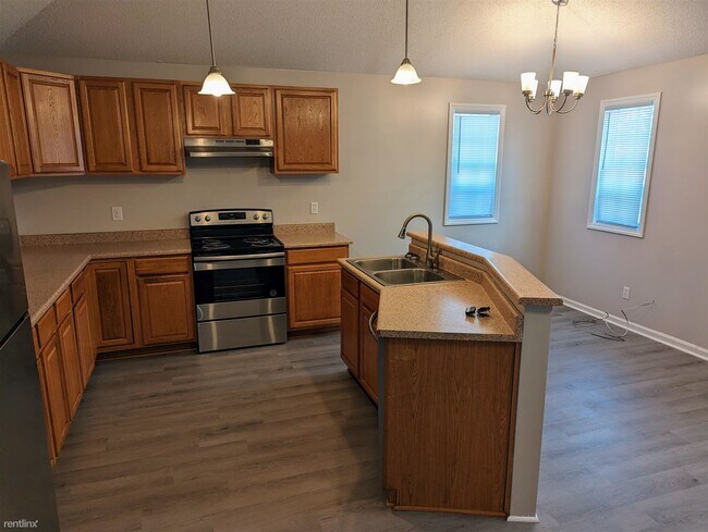 Building Photo - 3 br, 2 bath House - 2 Symbolic Court