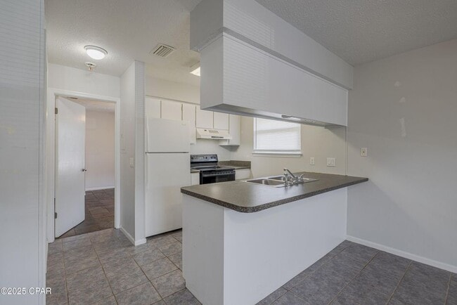 Foto del edificio - 7813 N Lagoon Dr
