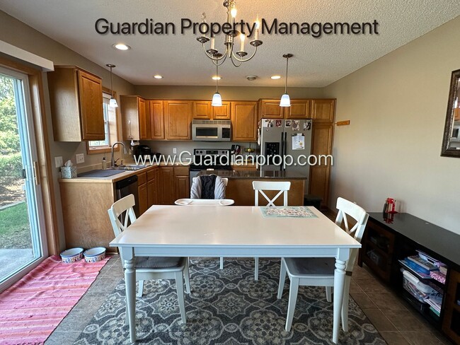 Building Photo - Lakeville End Unit Town Home, 2 Car Garage, 2.5 Baths, Walk out Patio, Available July