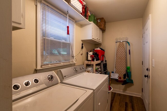 Laundry room with door going into carport - 1131 Magnolia Dr