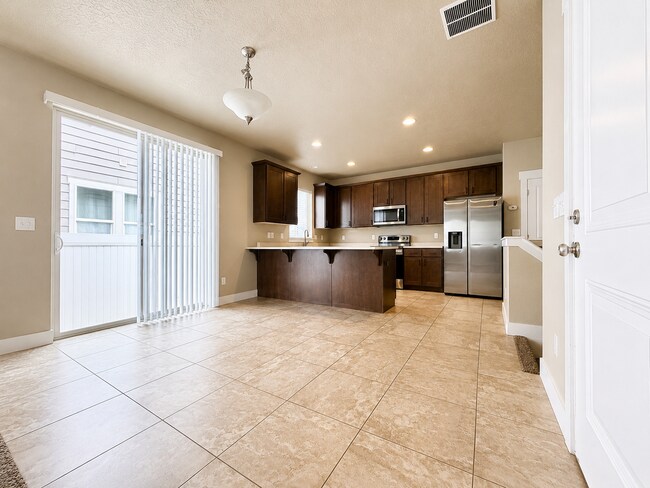 Building Photo - Beautiful 3BR Home with Fenced Yard, 2-Car Garage & Huge Storage – Prime Midvale Location!
