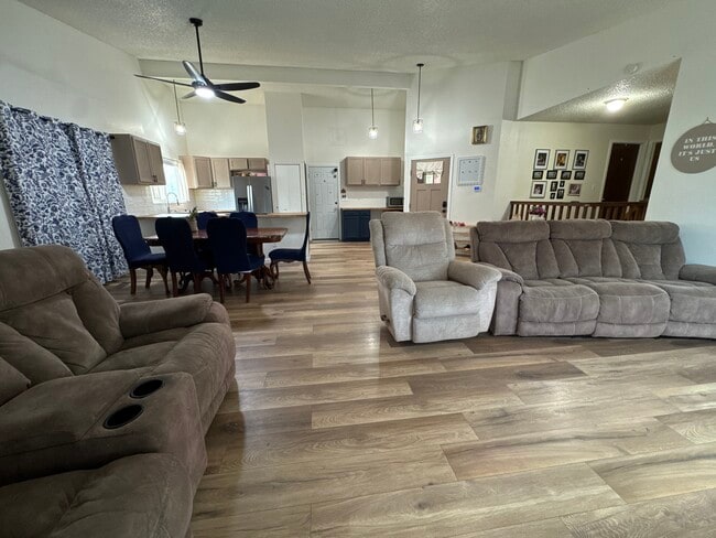 Main Living Area with Open Concept giving access to the front yard, back yard, and garage. - 3685 Deep Haven Dr
