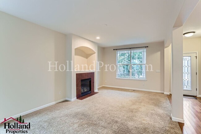 Building Photo - ** New Price! ** Spacious Two-Level Home i...
