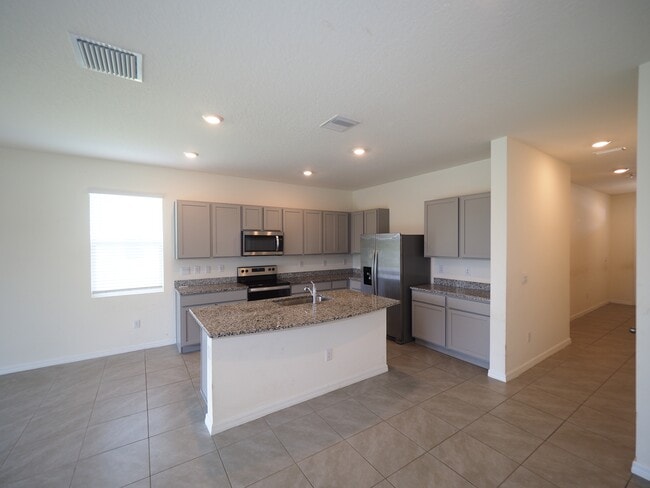 Photo - 1738 Woodleaf Hammock Ct Townhome