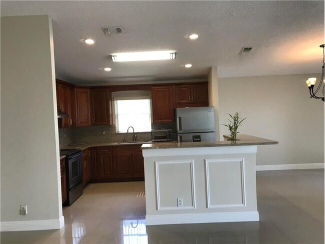 Building Photo - 12071 Palm Cove Ln