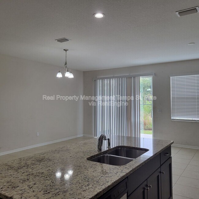 Foto del edificio - 6409 Tillandsia Pl