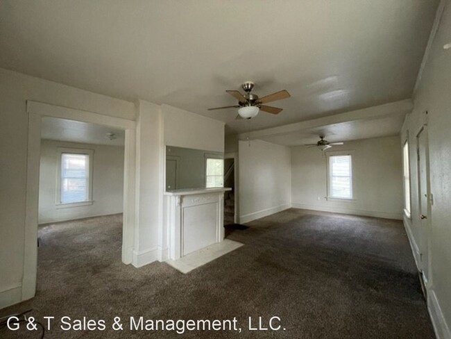 Building Photo - 4 br, 1.5 bath House - 710 W. Church