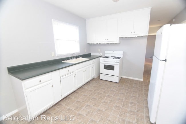 Foto del edificio - 413-415 E 9th St