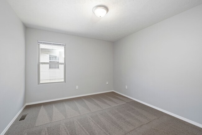 Building Photo - Republic Duplex for rent- with fence!