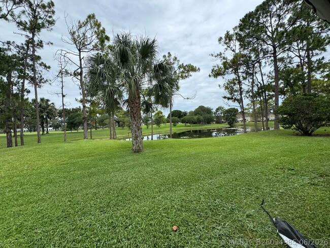 Building Photo - 1803 Palm Beach Trace Dr