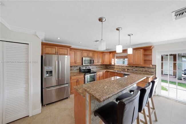 Building Photo - 9312 SW 40th Terrace 9312, Miami, FL 33165