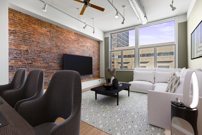 Living room with exposed brick and 12' ceilings - 15 Brown St