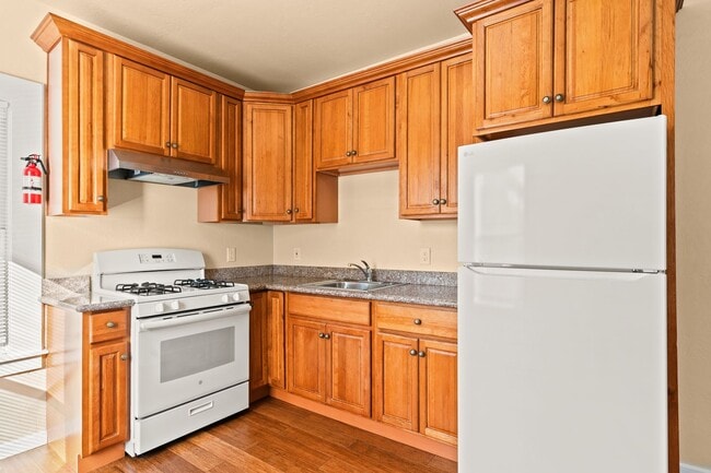 Building Photo - Utilities Included! Bright 1BD w/ Granite Kitchen & Plank Flooring