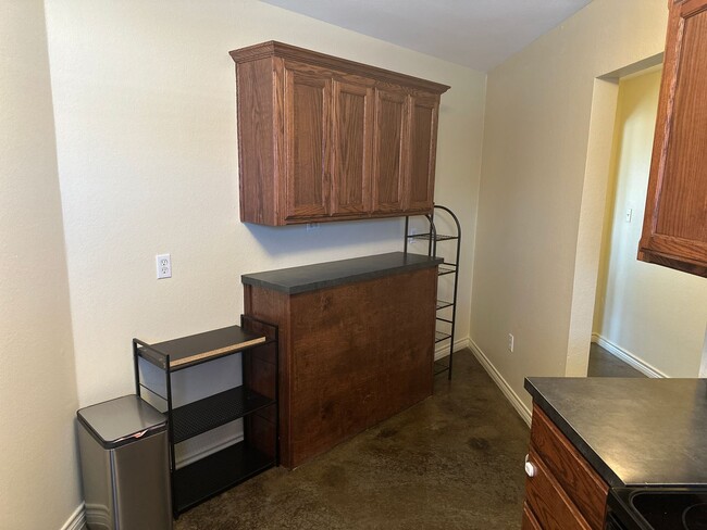 Building Photo - Unusual place but GREAT apartment! Gated &...