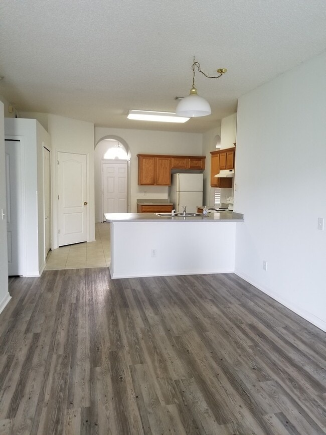 Building Photo - Lovely Four Bedroom with Pond View