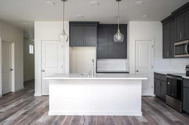 Kitchen with stainless steel appliances - 1965 NW 19th Ct