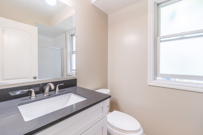 Modern, polished bathroom - 2620 Regent Apartments