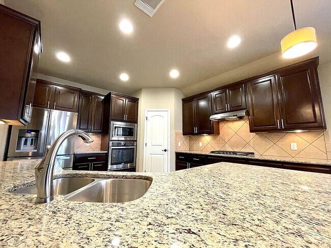 Building Photo - 8388 Angelo Loop