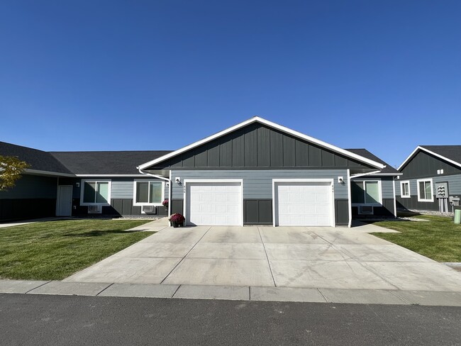 Attached garage/driveway included - Jayhawks Patio Home Apartments