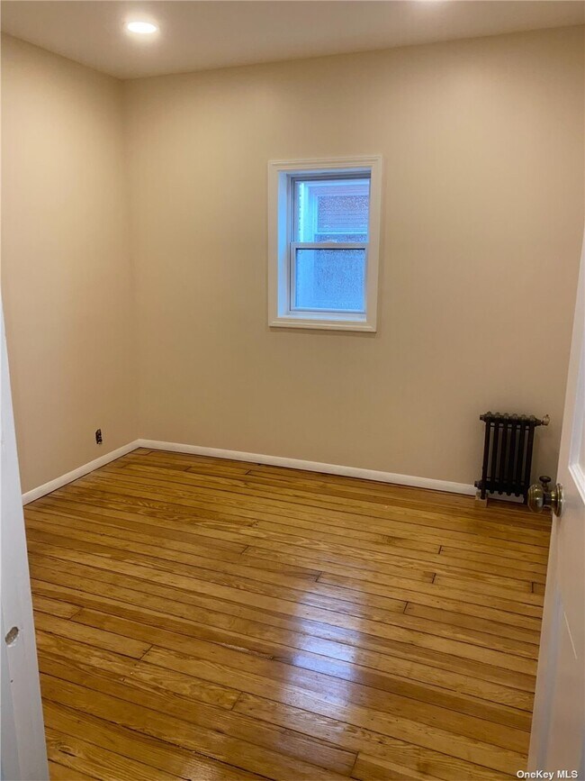 Building Photo - 62-24 60th Dr
