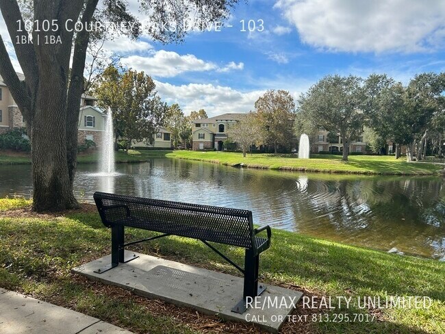 Building Photo - Courtney Palms - 10105 Courtney Oaks #103 ...