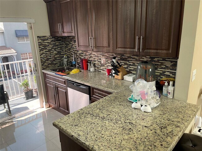 Building Photo - 7040 NW 173rd Dr