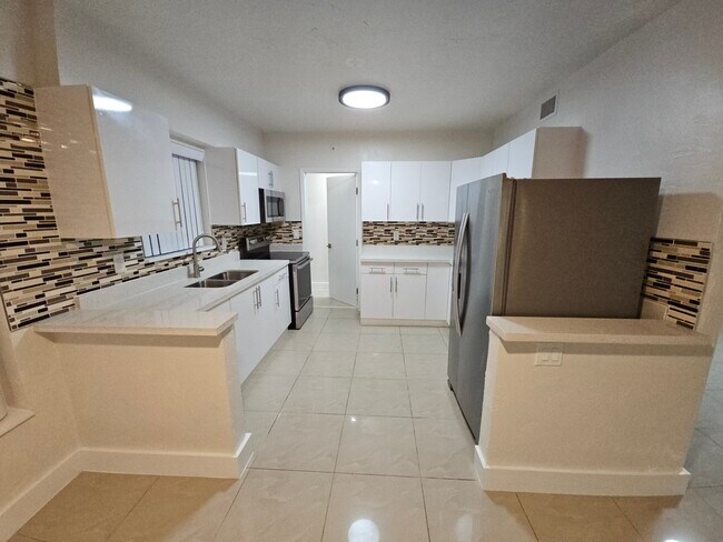 Foto del edificio - 512 NW 113th St