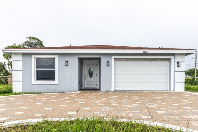 Building Photo - 163 W Blue Heron Blvd