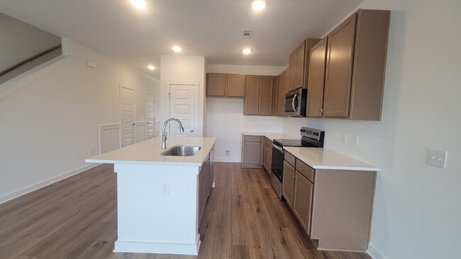 Foto del edificio - "Charming 3-Bed Oasis with Granite Elegance on Discovery Point Drive!"