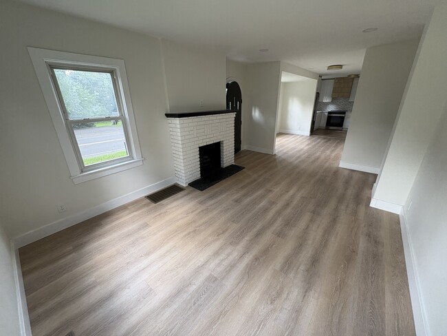 Living room with electric fireplace - 117 Green Ln