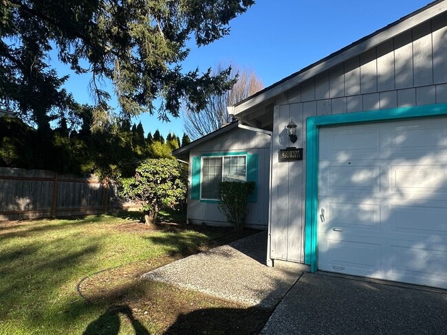 Building Photo - Spacious & Stylish 3BD Home with Iconic Stone Fireplace + Soaking Tub