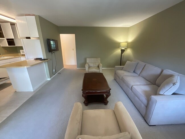 Building Photo - Available Now is a Beautiful Condo Located...