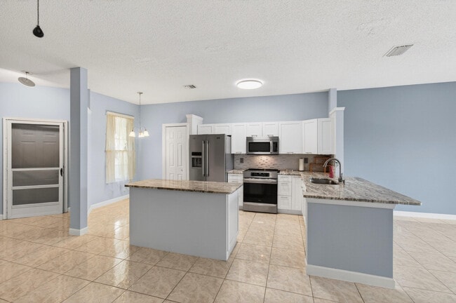 Building Photo - 3162 Via Poinciana