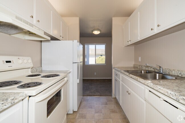 2 habitaciones, 1,25 baños - 940 pies cuadrados - Cocina - Hacienda Apartments