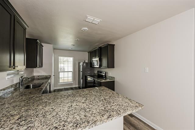 Foto del edificio - 122 Bluebonnet Dr