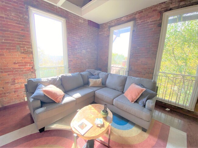Living room flooded with light - 1877 Walker St