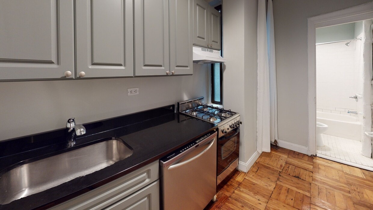 Photo - 715 E 5th St Apartment