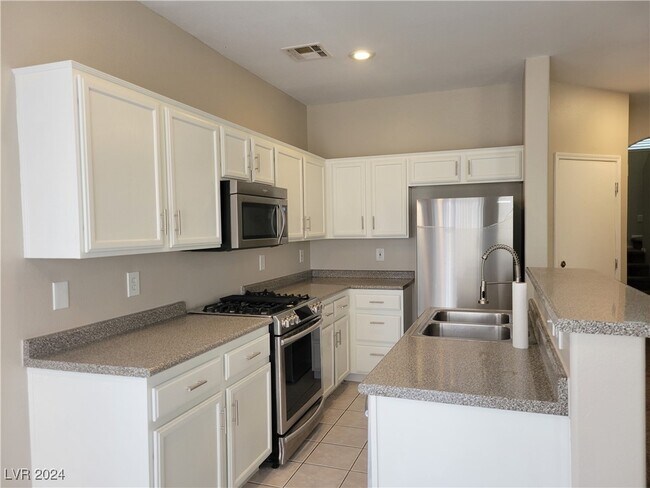 Building Photo - 5923 W Santoli Ave