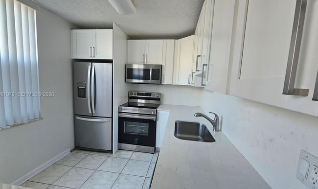 Building Photo - 9480 Tangerine Pl