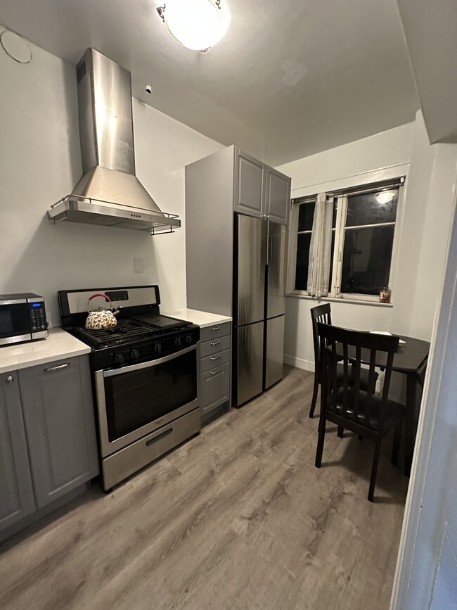 Kitchen with eating area - 360 W Ocean Blvd