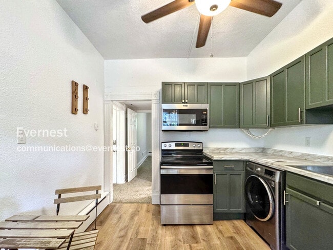 Building Photo - 3127 W 28th Ave