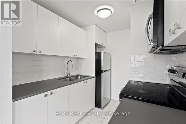 Building Photo - 7555 Goreway Dr
