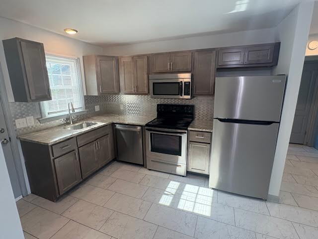 Building Photo - "Cozy 2-Bedroom Retreat with Granite Elega...