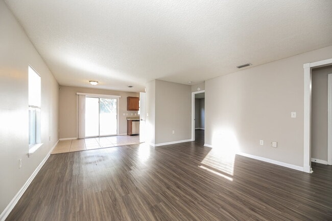 Building Photo - 7899 Cherry Blossom Dr N