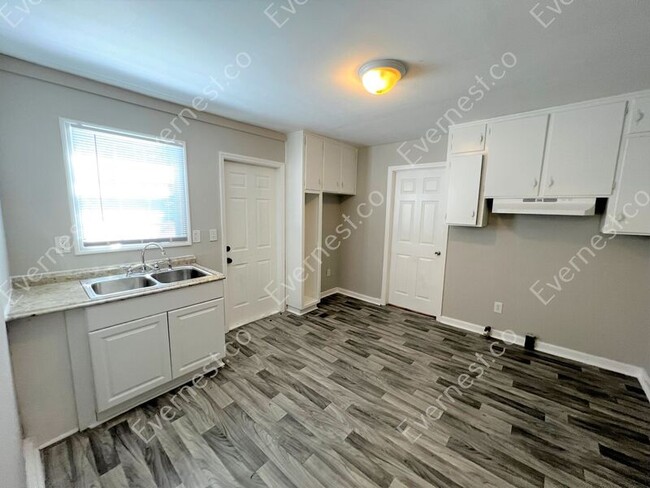 Building Photo - 8216 Rugby Ave