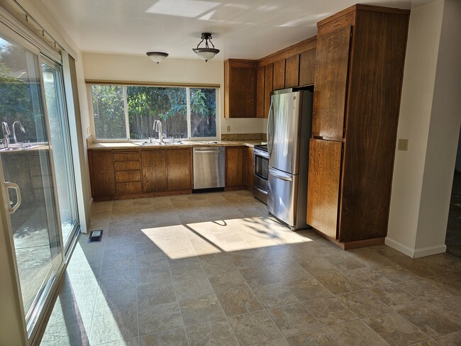 Kitchen and dining area - 328 Burning Tree Dr