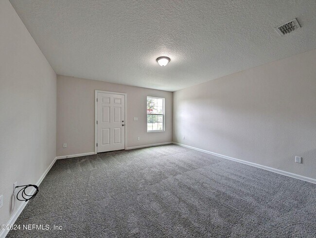 Building Photo - 8470 McGirts Village Ln