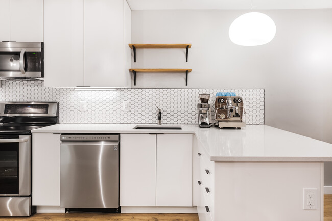 kitchen sink, dishwasher, stove and microwave - 523A Irving St NW